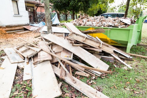 A team removing demolition debris at a Highgate site